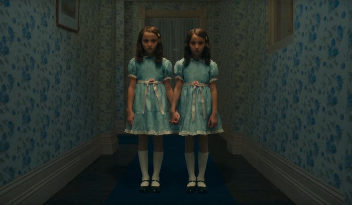 Doctor Sleep The Grady twins stand in the middle of the hallway