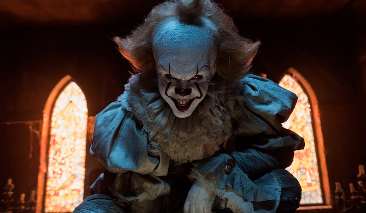 Pennywise the Dancing Clown with a demented smile in IT