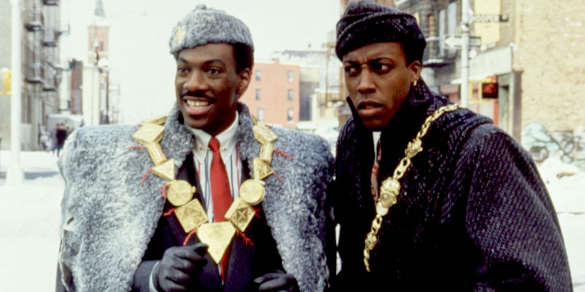 Coming To America Akeem and Semmi dressed up on the streets of New York