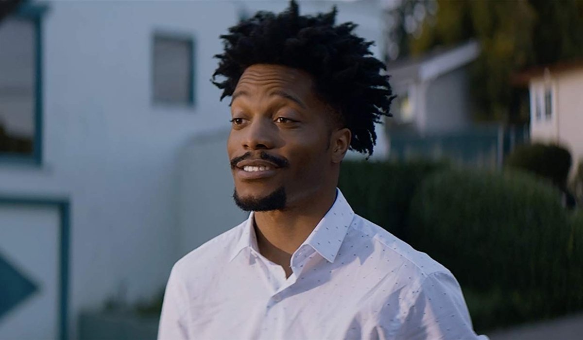 Sorry To Bother You Jermaine Fowler talking on a neighborhood street