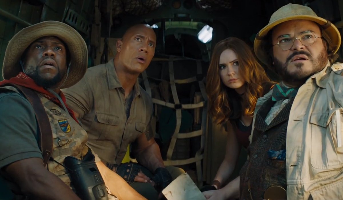 Jumanji: The Next Level the game avatars looking out of a cargo plane