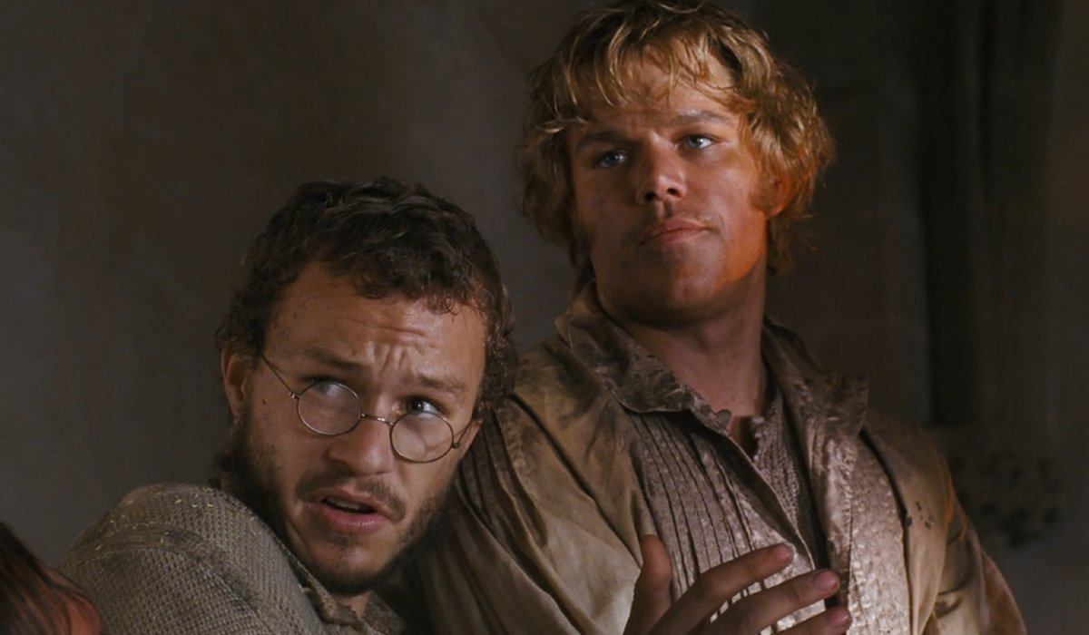 The Brothers Grimm Heath Ledger tells a story while Matt Damon smirks