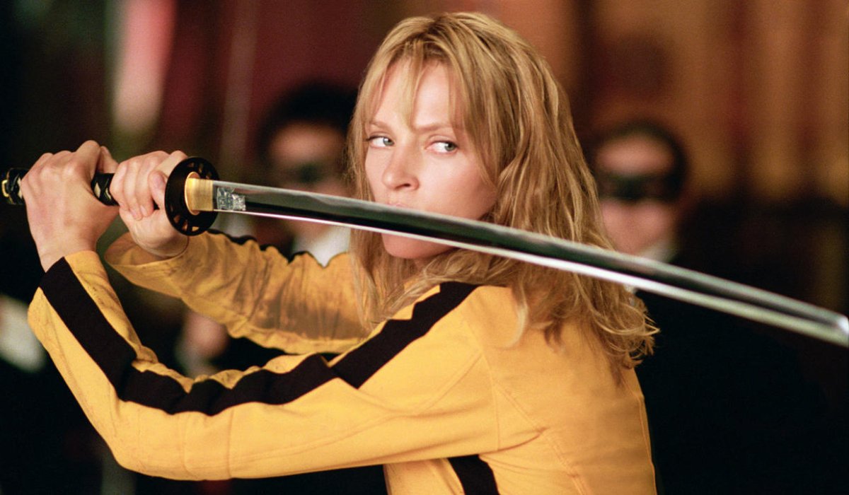 Kill Bill Vol. 1 The Bride holds her sword in front of her face, ready to attack