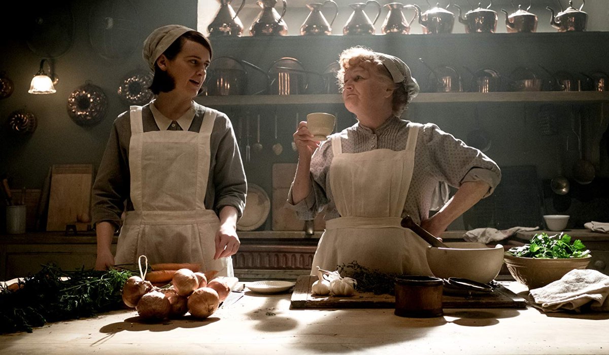 Downton Abbey Daisy and Miss Patimore bonding in the kitchen, as the sun streams in