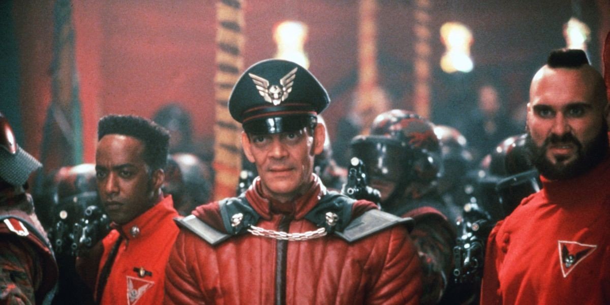Raul Julia in the middle with the cool hat