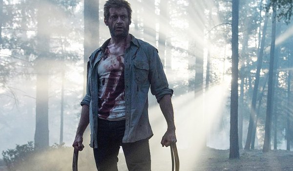 Logan Hugh Jackman claws out in the forest