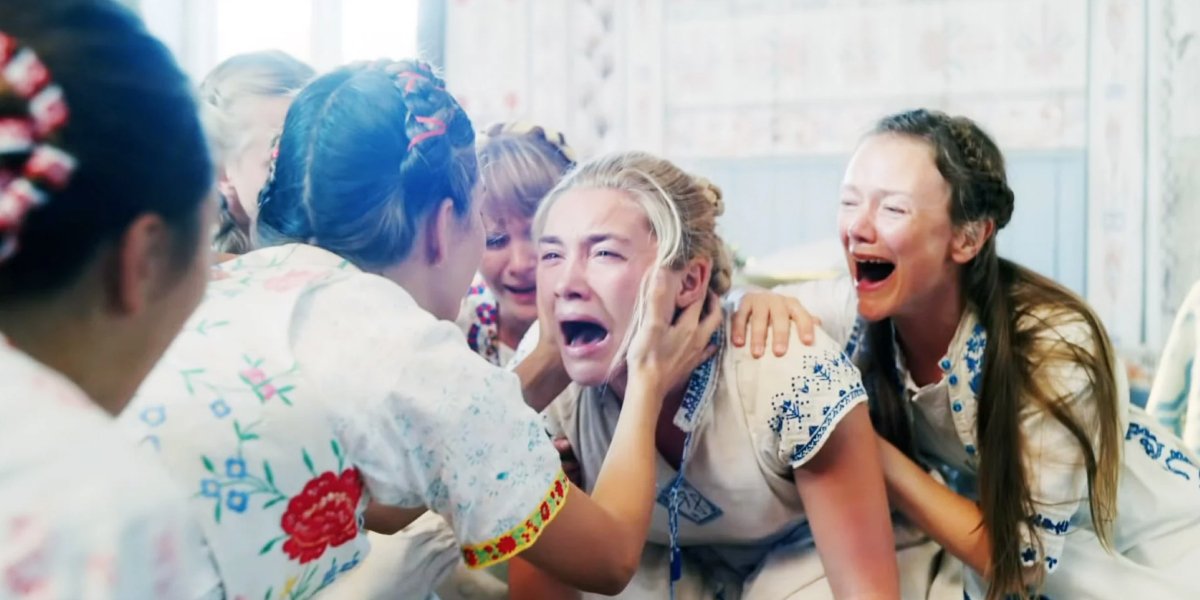 Florence Pugh surrounded by natives in Midsommar