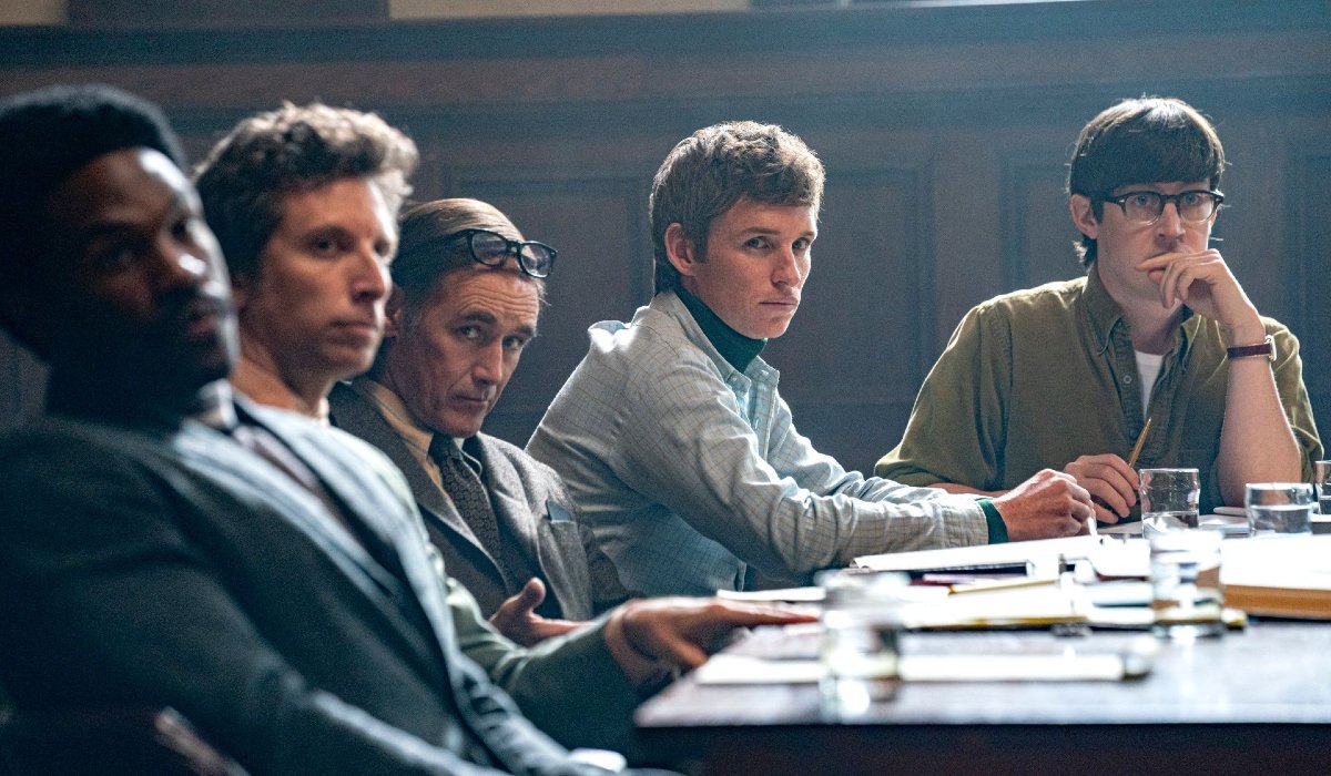 The Trial of The Chicago 7 Yahya-Abdul Mateen II, Mark Rylance, and Eddie Redmayne sit together in court